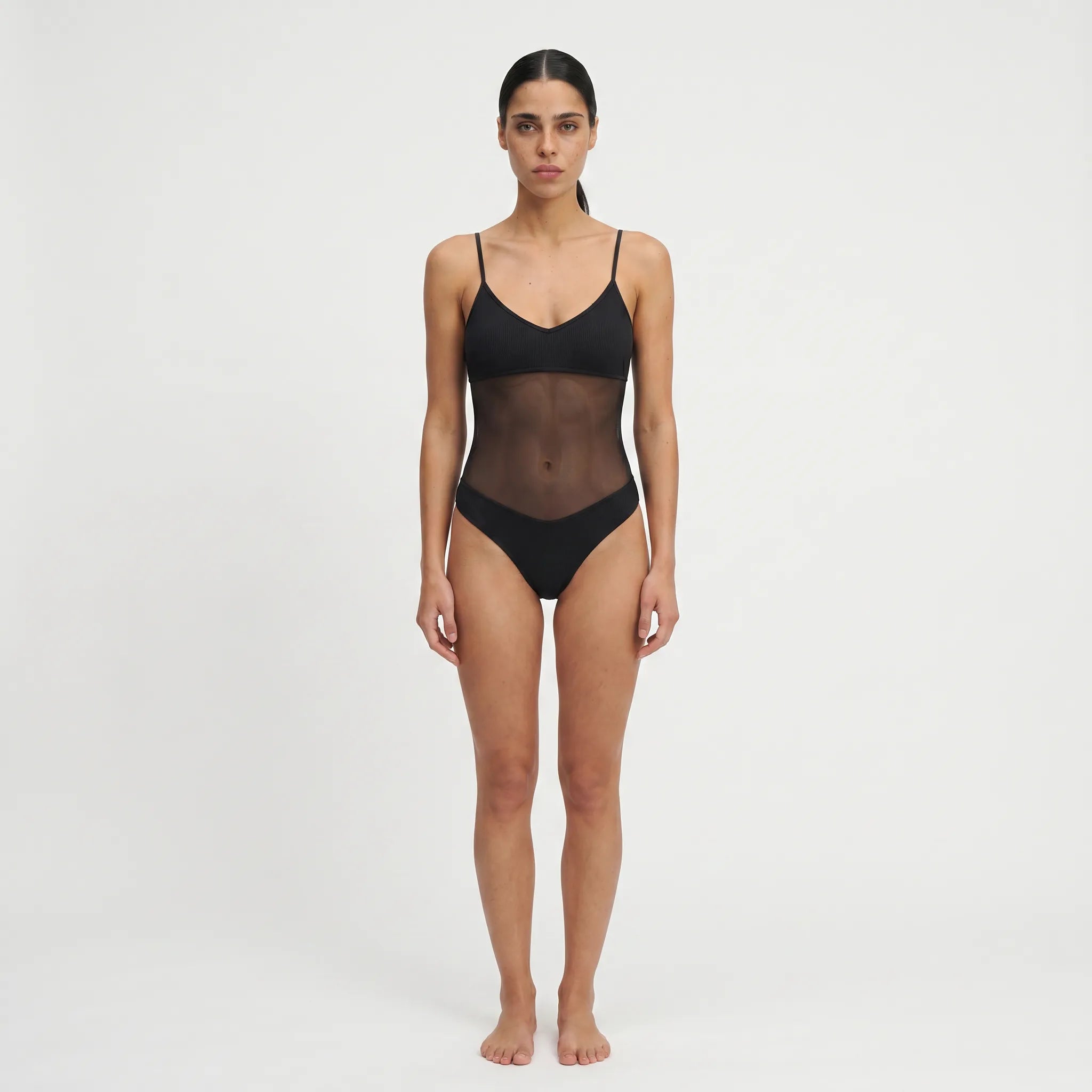 TWO TANNED ONEPIECE - Durchbräunend