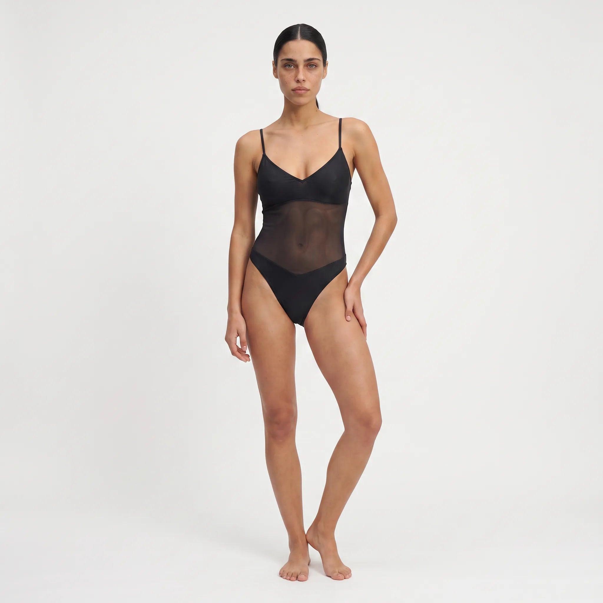 TWO TANNED ONEPIECE - Durchbräunend