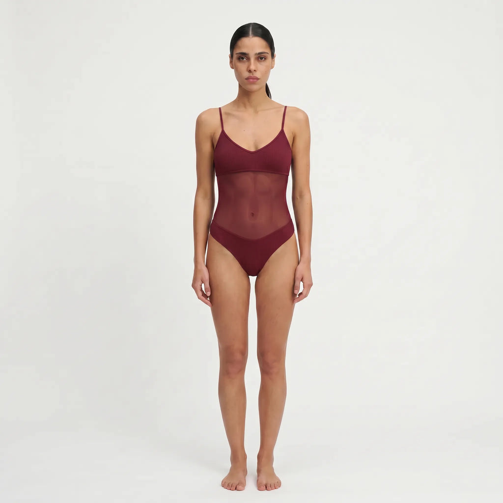 TWO TANNED ONEPIECE - Durchbräunend