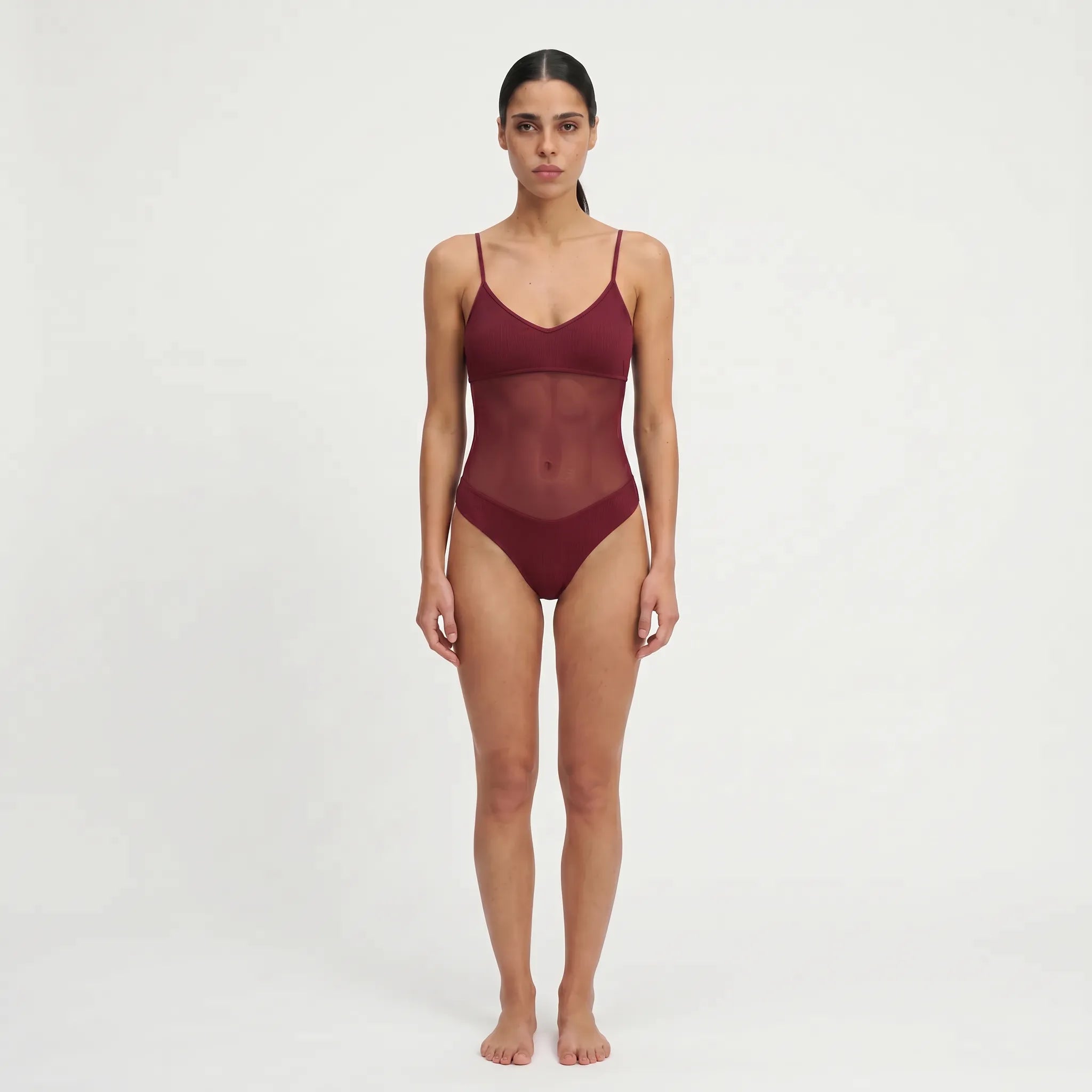 TWO TANNED ONEPIECE - Durchbräunend