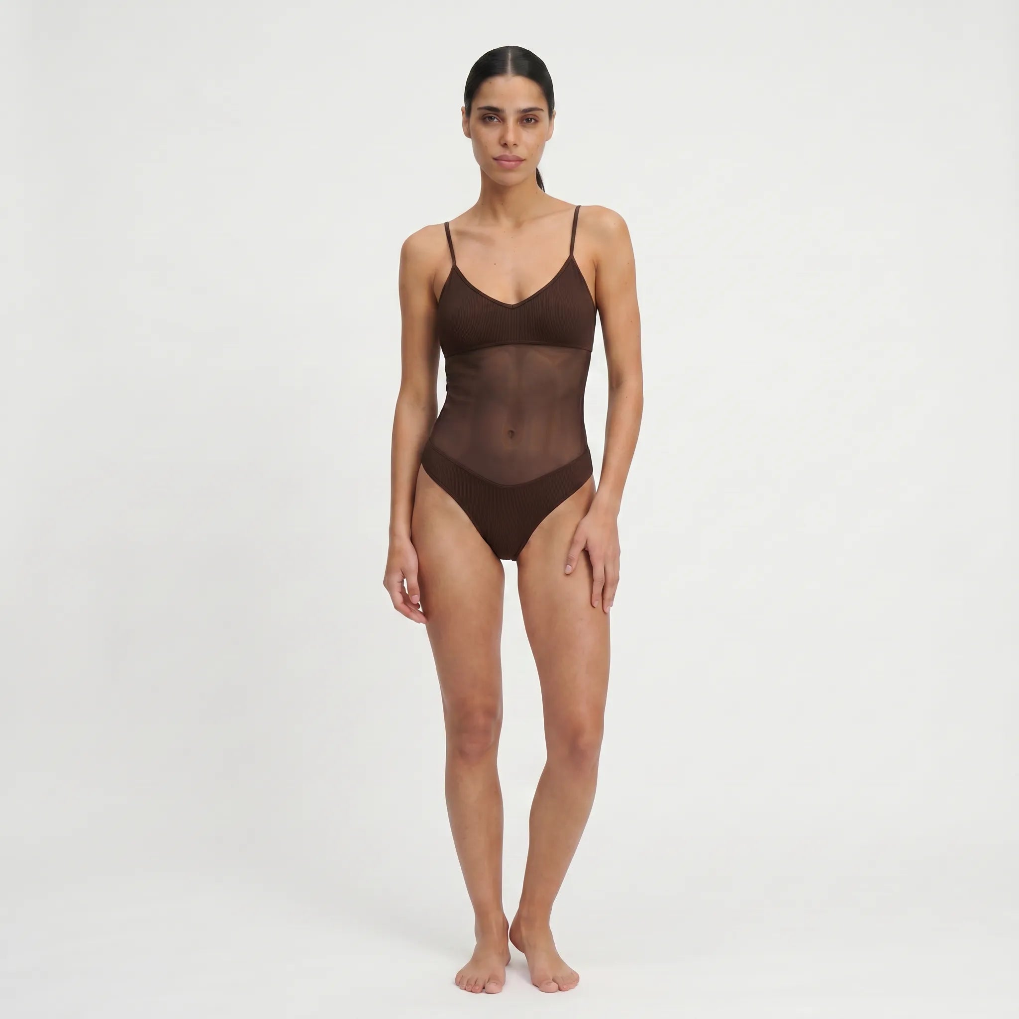 TWO TANNED ONEPIECE - Durchbräunend
